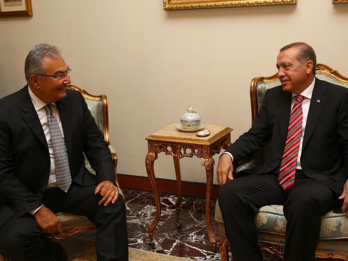 أردوغان (يمين) أثناء لقائه بايكال لبحث افتتاح الدورة الجديدة للبرلمان(غيتي)