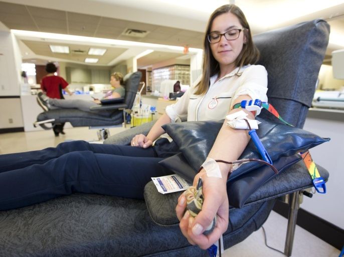 TORONTO, ON - MAY 26: 26 May 2015 Canadian Blood Services donation clinic on College Street. Photo of donor Nora Milne. For Insight feature on strategies that have reduced demand on the Canadian blood supply and new theories on the dangers of ordinary transfusions. (Keith Beaty/Toronto Star via Getty Images)