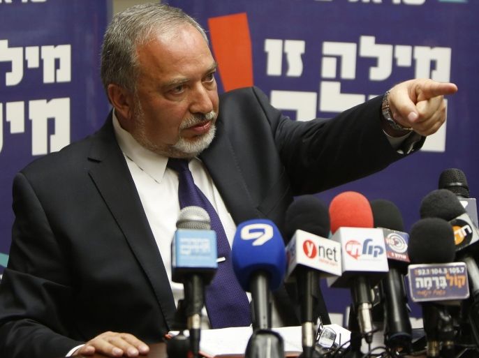 Israeli Foreign Minister Avigdor Lieberman gestures during a press conference at the Knesset in Jerusalem on May 4, 2015, announcing his Yisrael Beitenu party would not be joining the coalition government being formed by Prime Minister Benjamin Netanyahu. The surprise announcement came just two days before a deadline for Netanyahu to present his new government, which he had hoped would be a rightwing religious lineup with a majority of 67 of the parliament's 120 seats. AFP PHOTO / GALI TIBBON
