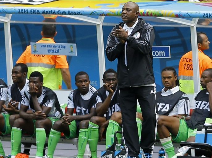 Nigeria's coach Stephen Keshi reacts during the FIFA World Cup 2014 round of 16 match between France and Nigeria at the Estadio Nacional in Brasilia, Brazil, 30 June 2014. (RESTRICTIONS APPLY: Editorial Use Only, not used in association with any commercial entity - Images must not be used in any form of alert service or push service of any kind including via mobile alert services, downloads to mobile devices or MMS messaging - Images must appear as still images and must not emulate match action video footage - No alteration is made to, and no text or image is superimposed over, any published image which: (a) intentionally obscures or removes a sponsor identification image; or (b) adds or overlays the commercial identification of any third party which is not officially associated with the FIFA World Cup) EPA/ROBERT GHEMENT