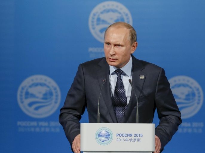 Russia's President Vladimir Putin reacts at a news conference after the Shanghai Cooperation Organization (SCO) summit in Ufa, Russia, July 10, 2015. REUTERS/Sergei Karpukhin