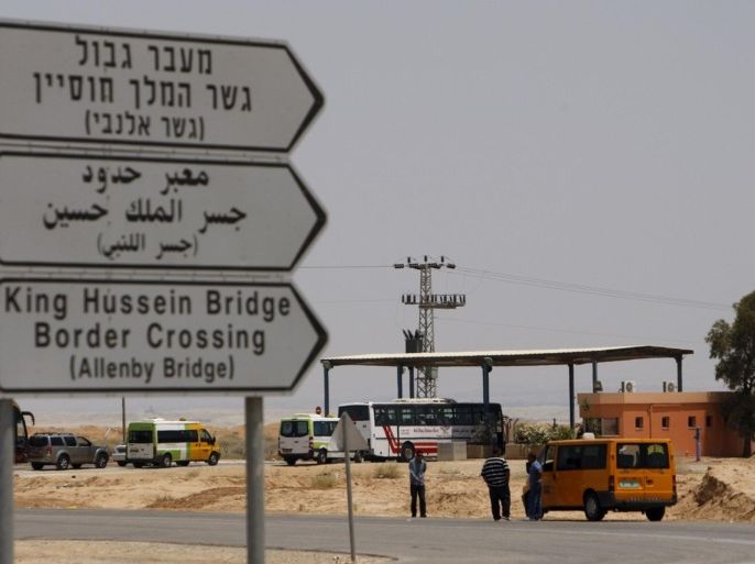 Vehicles drive towards the Allenby Bridge Crossing July 9, 2009. Israel said on Wednesday it would allow the crossing between the occupied West Bank and Jordan to remain open 24 hours a day to help the Palestinian economy. The Israeli-controlled terminal leading to the Allenby Bridge across the Jordan River is the West Bank's only land link to the Arab world.
