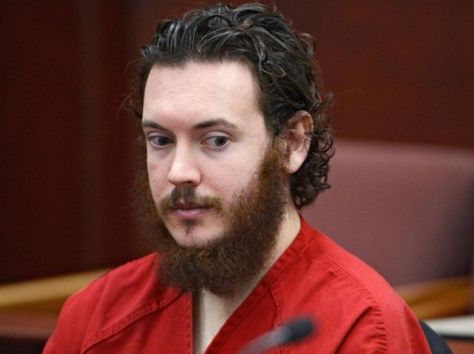 James Holmes sits in court for an advisement hearing at the Arapahoe County Justice Center in Centennial, Colorado in this file photo from June 4, 2013. A Colorado jury sentenced Holmes to life in prison August 7, 2015, rejecting the death penalty for the 27-year-old who entered a midnight showing of a Batman movie wearing a gas mask, helmet and body armor and shot dead a dozen people. REUTERS/Andy Cross/Pool/Files