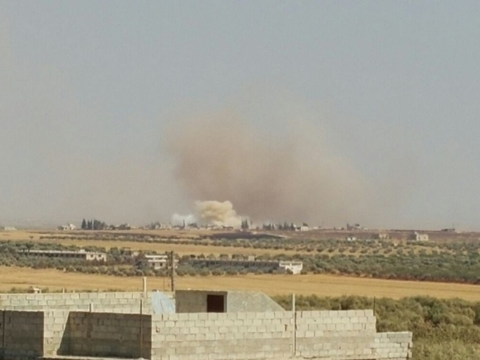 ‪قصف المعارضة لمراكز النظام في بلدة باشكوي‬ (الجزيرة)