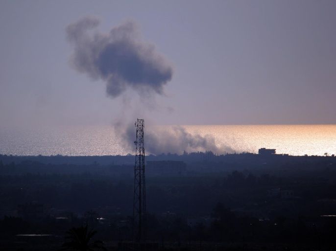 RAFAH, GAZA - JULY 16: A picture taken from Gaza part of Rafah shows smoke rising as airstrikes of Egyptian air forces target Rafah city of Egypt on July 16, 2015.
