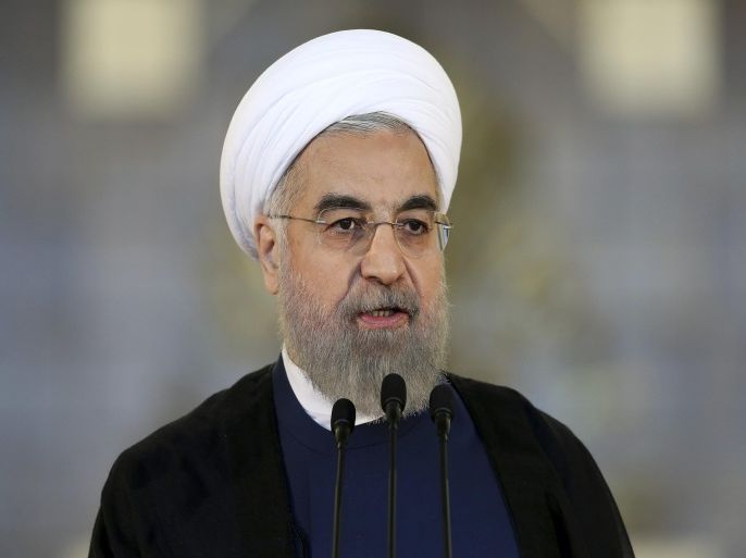 Iran's President Hassan Rouhani addresses the nation in a televised speech after a nuclear agreement was announced in Vienna, in Tehran, Iran, Tuesday, July 14, 2015. After long, fractious negotiations, world powers and Iran struck a historic deal Tuesday to curb Iran's nuclear program in exchange for billions of dollars in relief from international sanctions - an agreement aimed at averting the threat of a nuclear-armed Iran and another U.S. military intervention in the Middle East. (AP Photo/Ebrahim Noroozi)