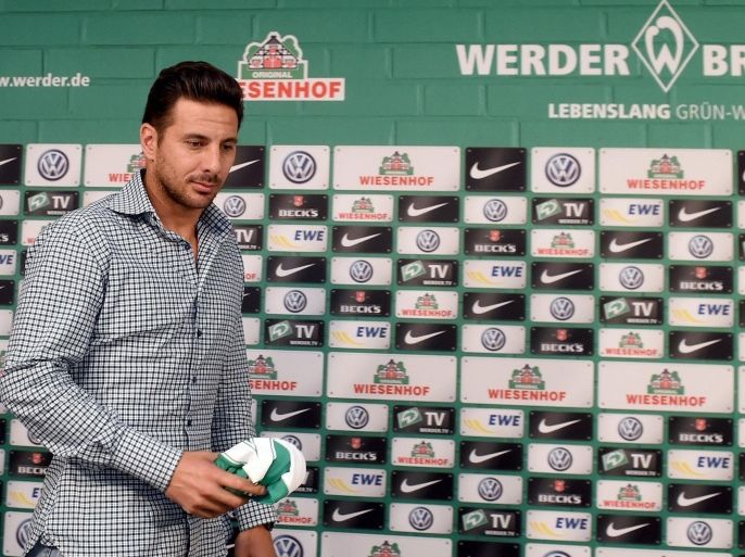 Soccer player Claudio Pizarro, of Peru, arrives for a news conference on the occasion of his introduction to the German Bundesliga soccer club Werder Bremen at Weserstadion arena in Bremen, Germany, 07 September 2015. Pizarro signed a contract which runs until the end of the season according to the German first soccer division club.
