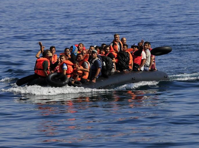 Migrants and refugees arrive at the coast of Mytilini, Lesvos island, Greece, on a dinghy after crossing from Turkey, 14 September 2015. Some 3,000 refugees disembark daily at the coasts of the island, coming from the Turkish coastline. Most of the refugees want to continue their journey to countries of north and central Europe.