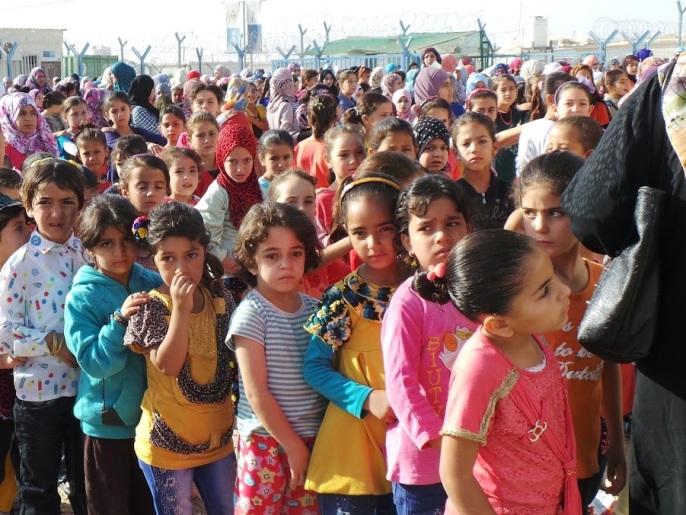 ‪عودة التلاميذ إلى المدارس في مخيم الزعتري للاجئين السوريين بالأردن‬ (الجزيرة)