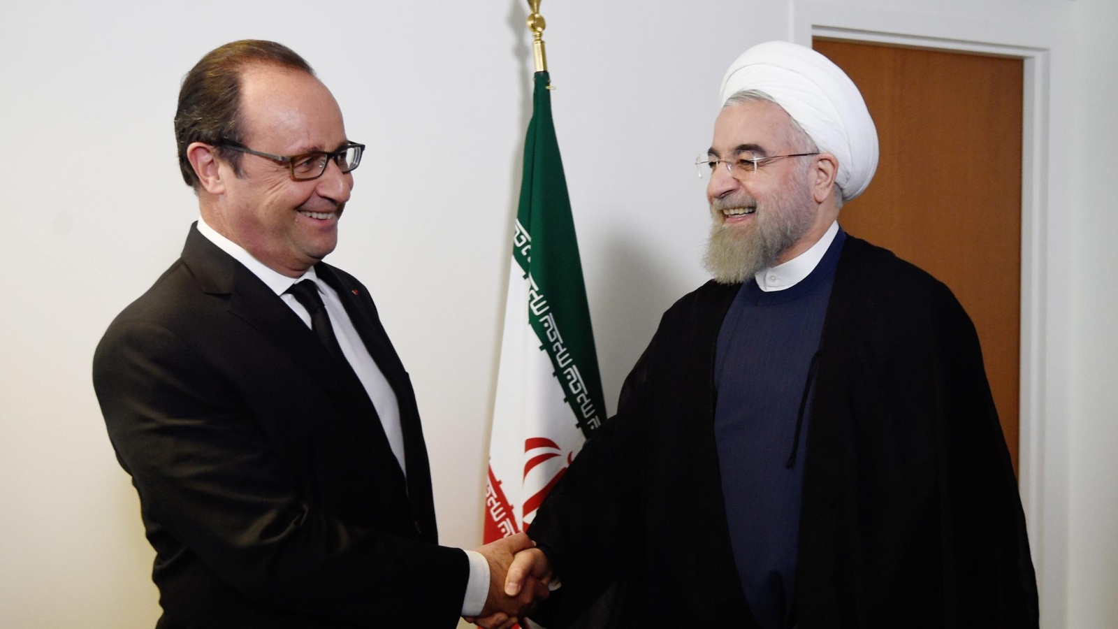 روحاني (يمين) التقى هولاند على هامش اجتماعات الجمعية العامة للأمم المتحدة (الأوروبية)