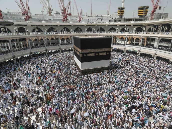 Muslim pilgrims circle the Kaaba, the cubic building at the Grand Mosque in the Muslim holy city of Mecca, Saudi Arabia, Sunday, Sept. 20, 2015. More than 1 million pilgrims have already arrived for the annual hajj pilgrimage, which is required of every Muslim who can afford it and is physically able to make it. (AP Photo/Mosa'ab Elshamy)