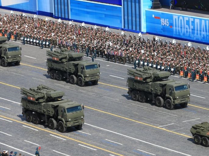 MOSCOW, RUSSIA - MAY 9: In this handout image supplied by Host photo agency / RIA Novosti, A BTR-82A armored personnel carrier and A Pantsir-S / SA-22 Greyhound self-propelled surface-to-air missile system during the military parade to mark the 70th anniversary of Victory in the 1941-1945 Great Patriotic War, May 9, 2015 in Moscow, Russia. The Victory Day parade commemorates the end of World War II in Europe.