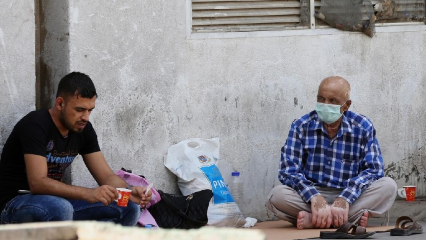 In this Tuesday, Sept. 22, 2015 photo, patients waits for treatment outside a cholera treatment clinic at the Medical City in Baghdad, Iraq. A cholera outbreak is the latest enemy plaguing the Iraq’s government amid a growing humanitarian crisis in the face of threat posed by the Islamic State group. At least 54 cases have been confirmed in Baghdad, as well as in the southern provinces of Najaf, Diwaniyah, Babil and Samawah, Health Ministry spokesman Rifaq al-Araji told The Associated Press on Tuesday. (AP Photo/Hadi Mizban)