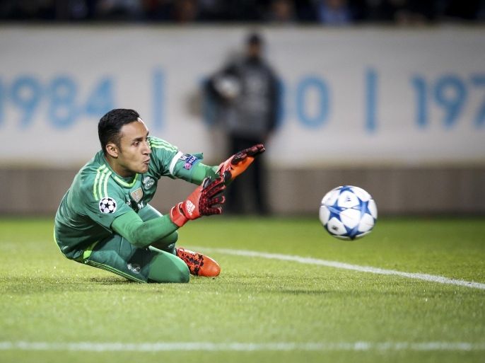 Real Madrid's goal keeper Keylor Navas makes a save during the UEFA Champions League group A football match between Malmo FF and Real Madrid at Malmo New Stadium in Malmo, Sweden, Wednesday Sept. 30, 2015. (Anders Wiklund / TT via AP) SWEDEN OUT