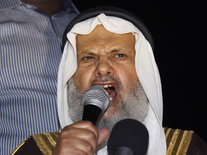 Leader of Jordan's Muslim Brotherhood Sheikh Hammam Said speaks during a protest calling for an end to Israeli air strikes in the Gaza Strip, near the Israeli embassy in Amman, July 20, 2014. More than 60 Palestinians and 13 Israeli soldiers were killed as Israel shelled a Gaza neighbourhood and battled militants on Sunday in the bloodiest fighting in a near two-week-old offensive. REUTERS/Majed Jaber (JORDAN - Tags: POLITICS CIVIL UNREST RELIGION HEADSHOT)