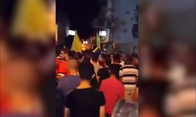 متظاهرون من حركة فتح في طولكرم يهتفون لكتائب القسام
