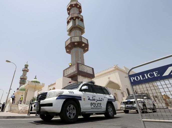 Police vehicles are parked outside the Al A'ali Grand Mosque where joint Sunni and Shi'ites prayers are to be held to show solidarity and co-existence between the two sects of Islam, ahead of Friday prayers in Al A'ali south of Manama, July 3, 2015. Following three bombings of Shi'ite mosques by the Islamic State militant group in Saudi Arabia and Kuwait since May 22, Sunnis and Shi'ites in Kuwait and in Bahrain will pray together in main mosques, as a sign of national unity and in a challenge to the militant group, which is expanding, notably in Egypt, Libya and Yemen, from its strongholds in Iraq and Syria. REUTERS/Hamad I Mohammed