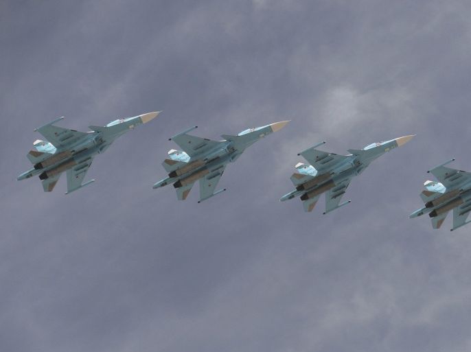 Sukhoi Su-34 Fullback tactical bombers fly in formation over the Red Square during the Victory Day parade in Moscow, Russia, May 9, 2015. Russia marks the 70th anniversary of the end of World War Two in Europe on Saturday with a military parade, showcasing new military hardware at a time when relations with the West have hit lows not seen since the Cold War. REUTERS/Host Photo Agency/RIA Novosti ATTENTION EDITORS - THIS IMAGE HAS BEEN SUPPLIED BY A THIRD PARTY. IT IS DISTRIBUTED, EXACTLY AS RECEIVED BY REUTERS, AS A SERVICE TO CLIENTS