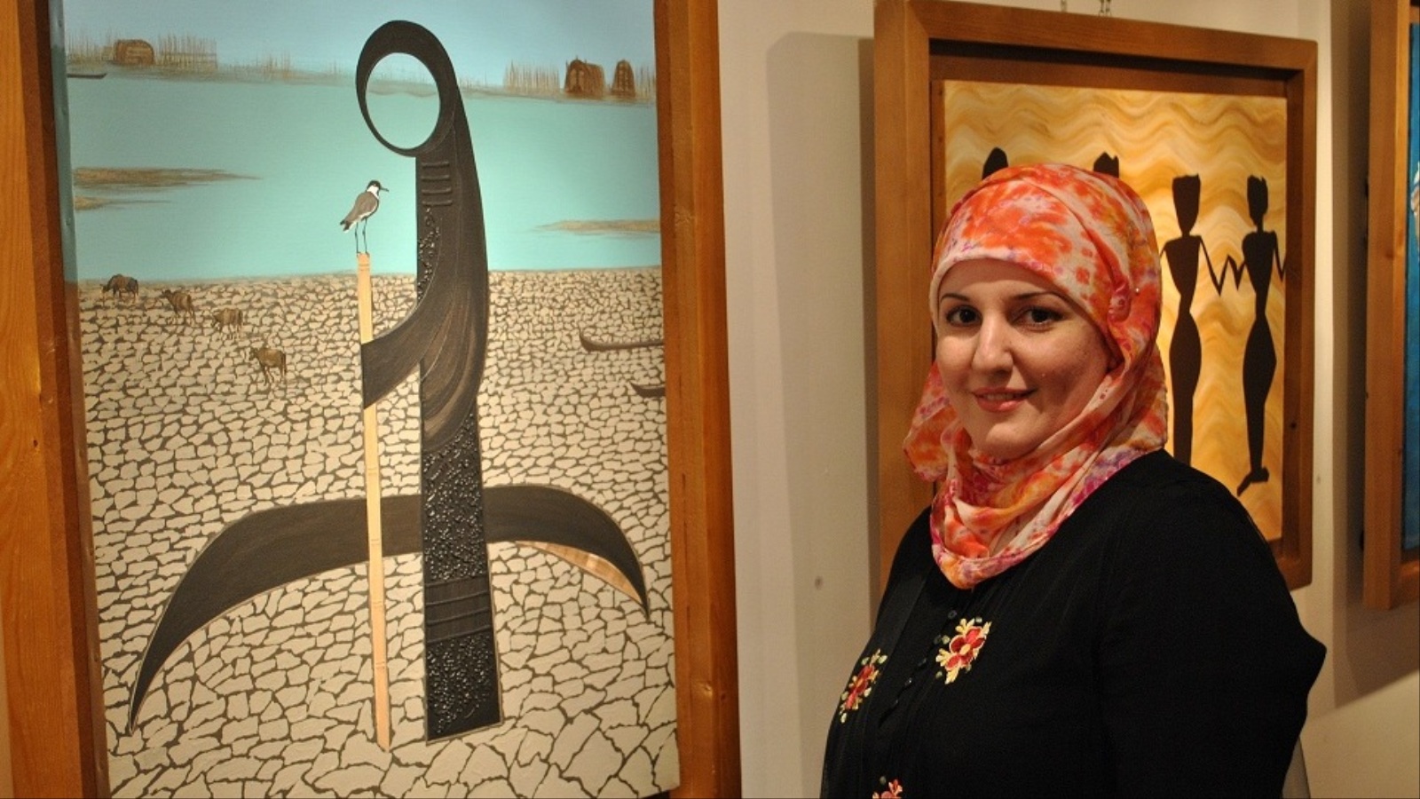 ‪الناصري قالت إن لوحاتها تضمنت قصائد سومرية من كتاب 