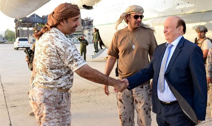 A handout photo released by the Yemeni Presidency Office shows Yemeni President Abdo Rabbo Mansour Hadi (R) arriving at Aden airport from his Saudi exile, in the southern city of Aden, Yemen, 17 November 2015. According to reports, Yemens exiled president Abdo Rabbo Mansour Hadi returned to Aden to lead an offensive against the Houthi rebels and their allies who control the capital Sanaa. Yemen has seen eight months of intense conflict since the Houthis advanced from Sana'a on Aden, forcing Hadi to flee the country to Saudi Arabia which leads a coalition launching military operations against Houthi positions in the impoverished country. EPA/YEMENI PRESIDENCY OFFICE / HANDOUT