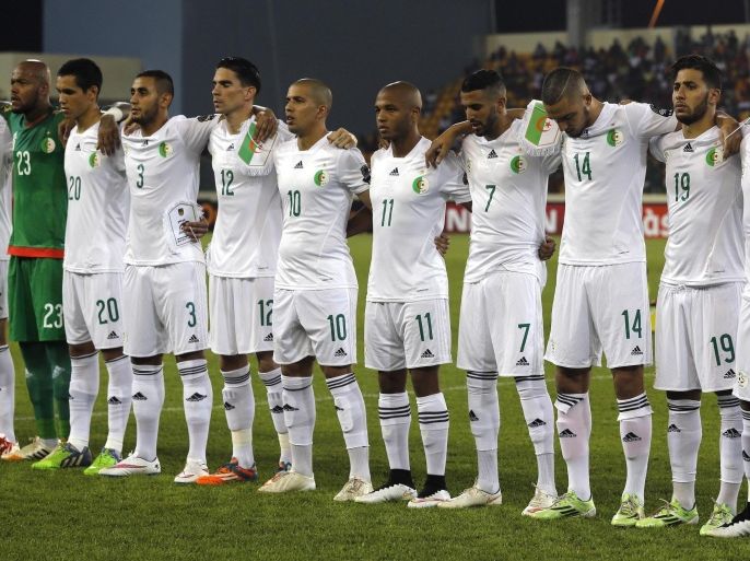 Algeria's national soccer team players listen to their national anthem before their quarter-final soccer match of the 2015 African Cup of Nations against Ivory Coast in Malabo February 1, 2015. REUTERS/Amr Abdallah Dalsh (EQUATORIAL GUINEA - Tags: SPORT SOCCER)