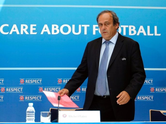 FILE - In this Aug. 28, 2015 file photo UEFA President Michel Platini arrives at a press conference after the soccer Europa League draw ceremony at the Grimaldi Forum, in Monaco. On Thursday, Oct. 8, 2015 file photo FIFA provisionally banned UEFA President Michel Platini for 90 days. (AP Photo/Claude Paris)
