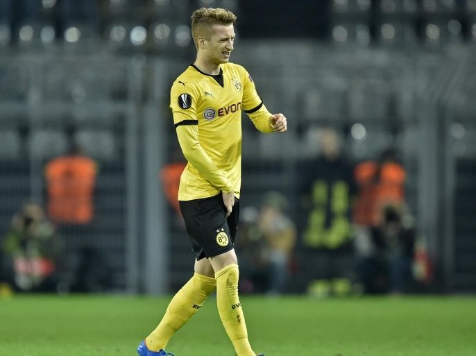 Dortmund's Marco Reus gets an injury during the Europa League group C soccer match between Borussia Dortmund and Qabala FC in Dortmund, Germany, Thursday, Nov. 5, 2015. (AP Photo/Martin Meissner)