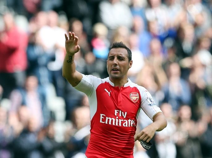 Arsenal's captain Santi Cazorla celebrates the victory at the end of their English Premier League soccer match between Newcastle United and Arsenal at St James' Park, Newcastle, England, Saturday, Aug. 29, 2015. (AP Photo/Scott Heppell)