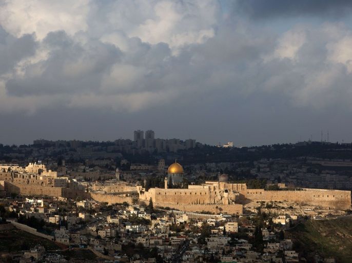 A general view shows the Dome of the Rock and the Al-Aqsa mosque (R) in Jerusalem's old city during the last day of the year, on December 31, 2015. AFP PHOTO