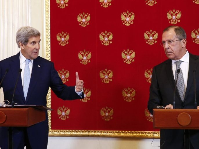 US Secretary of State, John Kerry, left, and Russia's Foreign Minister, Sergey Lavrov, address a joint press conference at the Kremlin, Tuesday, Dec. 15, 2015 in Moscow. Earlier, in talks with Russian Foreign Minister Sergey Lavrov, Kerry said the world benefits when great powers agree in their approaches to major crises. (Sergei Karpukhin/Pool Photo via AP)