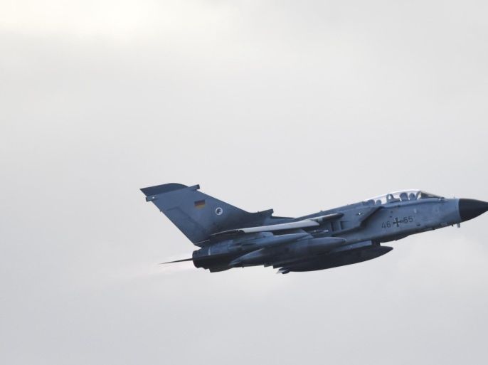 A Tornado aircraft of the Tactical Air Force Wing 51 'Immelmann' is pictured during a demonstration flight at German army Bundeswehr airbase in Jagel near the German-Danish border, December 4, 2015. The German Bundestag lower house of parliament is expected to support plans approved by Merkel's cabinet earlier this week to deploy up to 1,200 soldiers, Tornado reconnaissance jets, refueling aircraft and a frigate as part of the military campaign against Islamic State. REUTERS/Fabian Bimmer