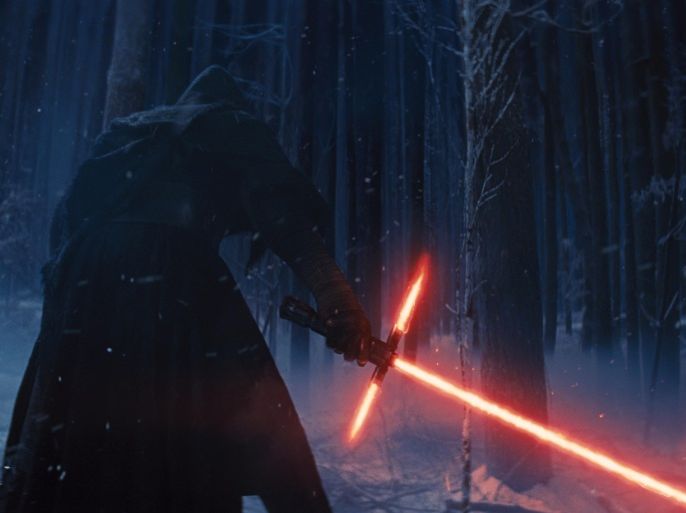 This photo provided by Disney shows, Adam Driver as Kylo Ren with his Lightsaber in a scene from the new film, "Star Wars: The Force Awakens." "Star Wars" isn't just strong. It's unstoppable. The revival of the nearly 40-year-old space saga has already dominated the box office and toy shelves. Now, it's also been selected as The Associated Press Entertainer of the Year and is amassing support for Academy Awards consideration. (Film Frame/Disney/Copyright Lucasfilm 2015 via AP)
