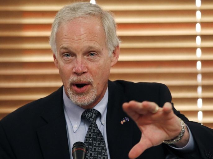 Sen. Ron Johnson, right, R-WI, chairman of the Homeland Security and Governmental Affairs Committee, speaks during a field hearing of the U.S. Senate Homeland Security and Governmental Affairs Committee at the Arizona Capitol Monday, Nov. 23, 2015, in Phoenix. (AP Photo/Ross D. Franklin)