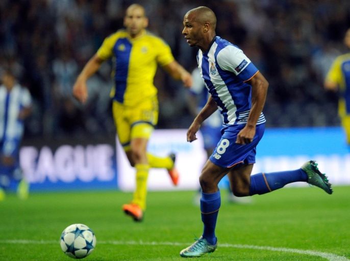 Porto’s Yacine Brahimi, center, drives the ball to score his side’s second goal during the Champions League group G soccer match between FC Porto and Maccabi Tel-Aviv FC at the Dragao stadium in Porto, Portugal, Tuesday, Oct. 20, 2015. (AP Photo/Paulo Duarte)