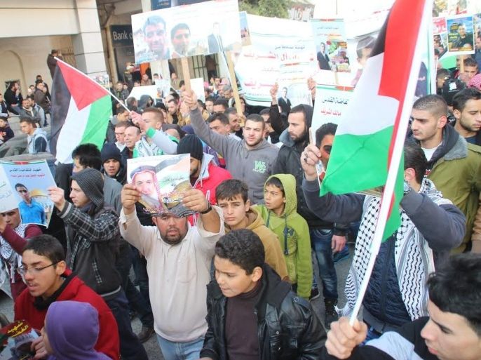مسيرة فلسطينية تطالب باسترداد جثامين الشهداء من الاحتلال الخليل فلسطين-2015 الجزيرة نت