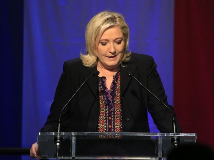 Far Right National Front party leader Marine Le Pen delivers her speech after the results of the second round of the regional elections in Henin-Beaumont, northern France, Sunday Dec.13, 2015. Marine Le Pen's far-right National Front collapsed in French regional elections Sunday after dominating the first round of voting, according to pollsters' projections. (AP Photo/Thibault Camus)