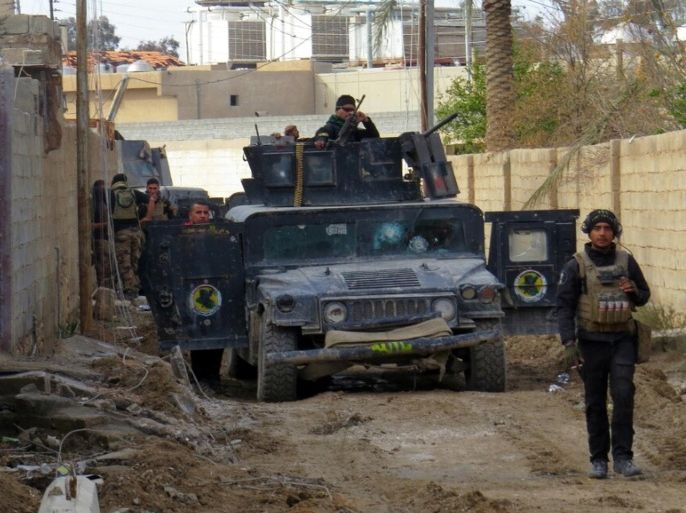 Iraqi security forces deploy around the grand Hospital after the expulsion of the Islamic State militants in central Ramadi, 70 miles (115 kilometers) west of Baghdad, Iraq. Wednesday, Jan. 6, 2016. Islamic State had captured Ramadi in May, in one of its biggest advances since the U.S.-led coalition began striking the group in 2014. Recapturing the city, which is the provincial capital of Anbar, provided a major morale boost for Iraqi forces. (AP Photo)