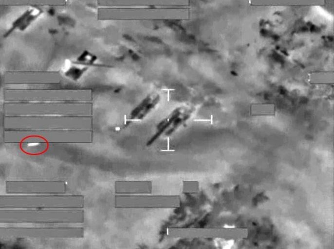 A handout image made available by the British Ministry of Defence (MOD) on 11 January 2016 shows a screen grab of footage taken on 10 January 2016 showing a Tornado flight using Brimstone missiles to attack a number of mobile cranes brought in by the jihadist militia referring to itself as Islamic State (IS, Daesh) to attempt to repair the severe damage inflicted by previous RAF and coalition air strikes on the Omar oil field. The Brimstone missile can be seen here circled in red. EPA/MOD / HANDOUT