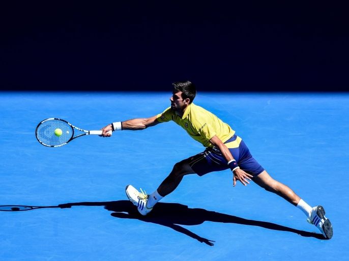 Novak Djokovic of Serbia returns the ball to Hyeon Chung of South Korea during the first round match of the Australian Open Grand Slam tennis tournament in Melbourne, Australia, 18 January 2016. The Australian Open tennis tournament runs from 18 to 31 January 2016.