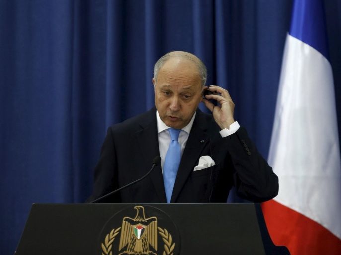 France's Foreign Minister Laurent Fabius attends a joint news conference with Palestinian Foreign Minister Riyad al-Maliki (not seen) in the West Bank city of Ramallah June 21, 2015. Prime Minister Benjamin Netanyahu prefaced talks about a French-led peace initiative on Sunday by saying foreign powers were trying to dictate to Israel a deal with the Palestinians. Fabius, on a two-day visit to the Middle East, met Palestinian leaders in the occupied West Bank before seeing Netanyahu later in the day.   REUTERS/Mohamad Torokman