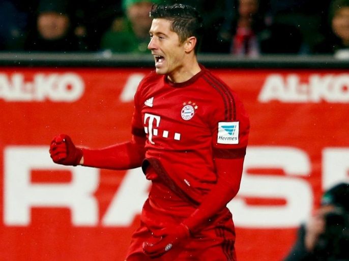 Football Soccer - FC Augsburg v Bayern Munich - German Bundesliga - WWK Arena, Augsburg, Germany - 14/02/16 Bayern Munich's Robert Lewandowski celebrates a goal against FC Augsburg. REUTERS/Michael Dalder DFL RULES TO LIMIT THE ONLINE USAGE DURING MATCH TIME TO 15 PICTURES PER GAME. IMAGE SEQUENCES TO SIMULATE VIDEO IS NOT ALLOWED AT ANY TIME. FOR FURTHER QUERIES PLEASE CONTACT DFL DIRECTLY AT + 49 69 650050