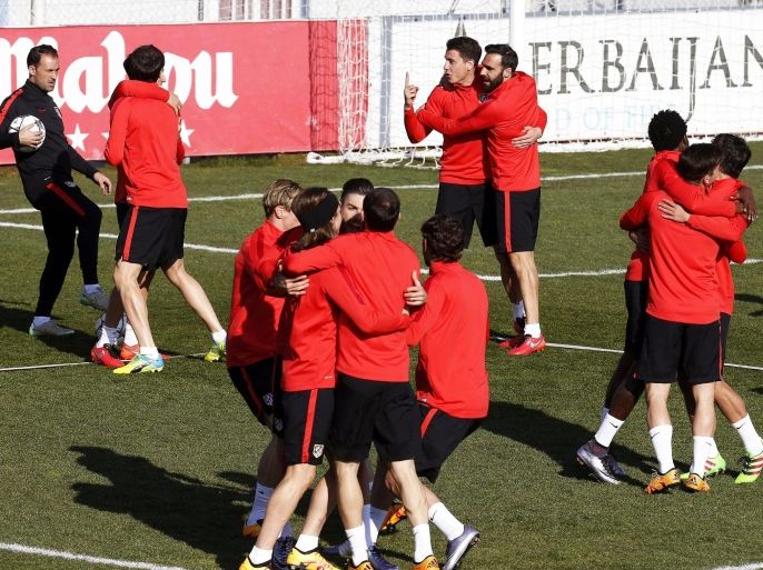 Atletico Madrid players attend their team's training session at Cerro del Espino Sports Complex in Majadahonda, Madrid, Spain, 14 March 2016. Atletico Madrid will face PSV Eindhoven in the UEFA Champions League round of 16, second leg soccer match at Vicente Calderon stadium on 15 March 2016.