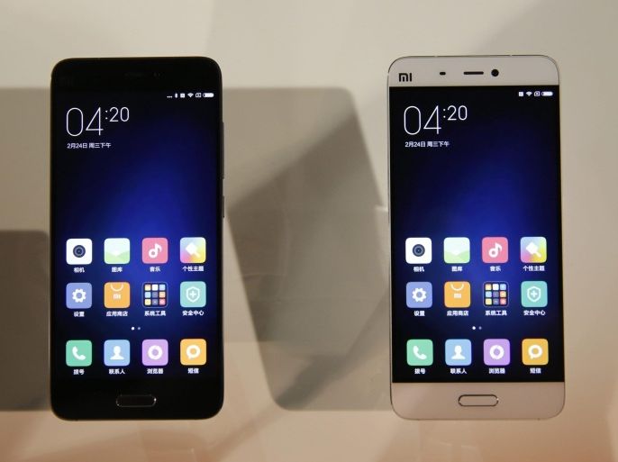 The new spartphone 'Xiaomi Mi 5' on display, after Lei Jun (not pictured), CEO of Chinese mobile internet company Xiaomi Technology Co. Ltd., introduced the new smartphone at the Xiaomi product launch ceremony in Beijing City, China, 24 February 2016. The phone comes in three versions, Standard with up to 32GB memmory, High Edition with up to 64GB memory and Exclusive Edition with up to 128GB memory. The top version also has the fastest Snapdragon processor and a rear-side made of ceramics.
