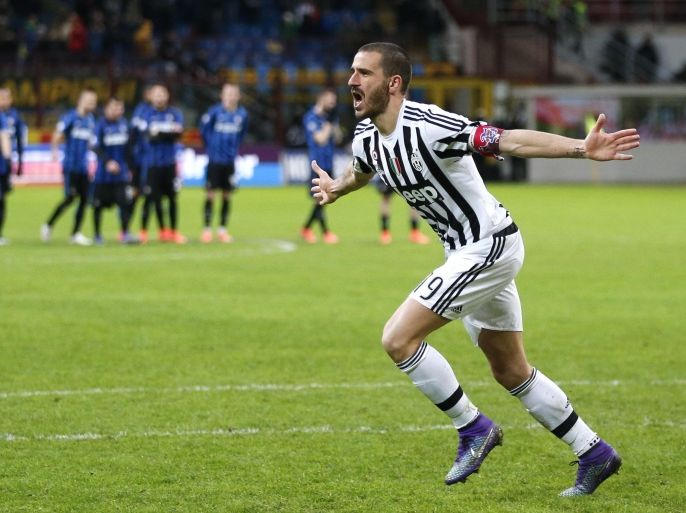 Juventus' Leonardo Bonucci celebrates after scoring the decisive goal that gave his team a 5-3 win over Inter Milan after a penalty shootout, during the Italian Cup second leg semifinal soccer match, at the San Siro stadium in Milan, Italy, Wednesday, March 2, 2016. (AP Photo/Antonio Calanni)