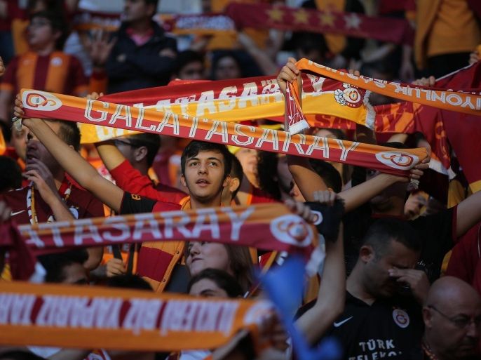 A file picture dated 31 May 2015 of Galatasaray fans during a victory ceremony to celebrate the Turkish Super League Championship title at Turk Telekom Arena Stadium in Istanbul, Turkey. Turkish record champions Galatasaray have been given a one-year ban from European football for breaking Financial Fair Play (FFP) rules, governing body UEFA said 02 March 2016. EPA/STR *** Local Caption *** 51969169