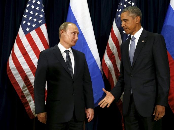 U.S. President Barack Obama extends his hand to Russian President Vladimir Putin during their meeting at the United Nations General Assembly in New York September 28, 2015. REUTERS/Kevin Lamarque