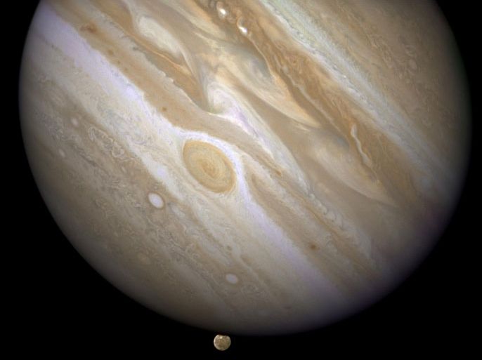The planet Jupiter is shown with one of its moons, Ganymede (bottom), in this NASA handout taken April 9, 2007 and obtained by Reuters March 12, 2015. Scientists using the Hubble Space Telescope have confirmed that the Jupiter-orbiting moon Ganymede has an ocean beneath its icy surface, raising the prospects for life, NASA said on Thursday. REUTERS/NASA/ESA and E. Karkoschka/Handout via Reuters (OUTERSPACE - Tags: SCIENCE TECHNOLOGY) ATTENTION EDITORS - THIS PICTURE WAS PROVIDED BY A THIRD PARTY. REUTERS IS UNABLE TO INDEPENDENTLY VERIFY THE AUTHENTICITY, CONTENT, LOCATION OR DATE OF THIS IMAGE. FOR EDITORIAL USE ONLY. NOT FOR SALE FOR MARKETING OR ADVERTISING CAMPAIGNS. THIS PICTURE IS DISTRIBUTED EXACTLY AS RECEIVED BY REUTERS, AS A SERVICE TO CLIENTS