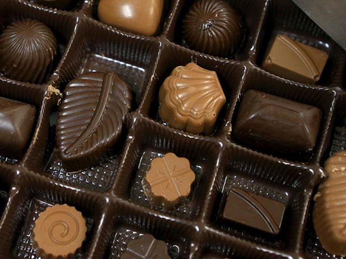 Assorted chocolates made by Bashar Ghraowi are displayed Thursday, April, 7, 2016, in Corpus Christi, Texas. Resettled in South Texas, the family's business venture, Ghraowi Chocolate Co., has opened in Corpus Christi. In the Middle East, especially Syria and Lebanon, the Ghraowi name is synonymous with chocolate. (Gabe Hernandez/Corpus Christi Caller-Times via AP) MANDATORY CREDIT; MAGS OUT; TV OUT