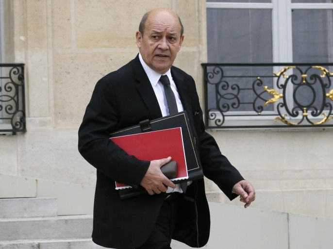 French Defence Minister Jean-Yves Le Drian leaves the Elysee Palace following the weekly cabinet meeting in Paris, France, March 24, 2016. REUTERS/Gonzalo Fuentes