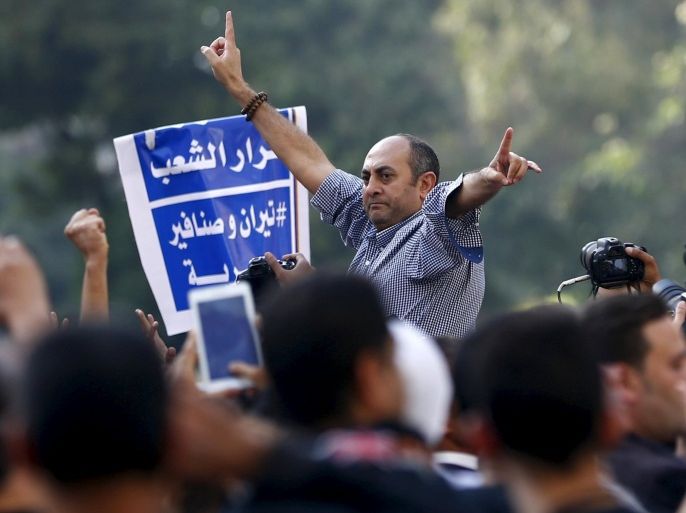 A former presidential candidate and lawyer Khaled Ali shouts slogans against President Abdel Fattah al-Sisi and the government during a demonstration protesting the government's decision to transfer two Red Sea islands to Saudi Arabia, in front of the Press Syndicate in Cairo, Egypt, April 15, 2016. REUTERS/Amr Abdallah Dalsh